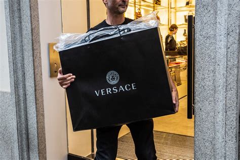 michael buys versace|michael kors buys versace.